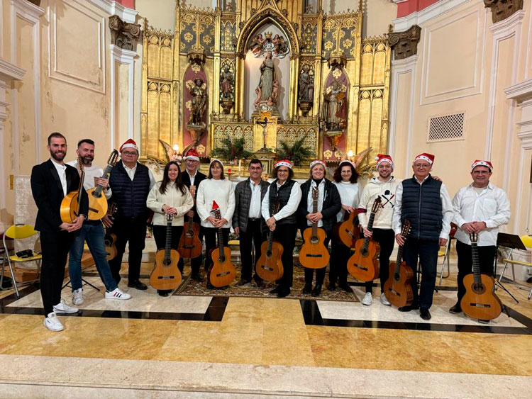 Foto de archivo de la rondalla de Pina tras un concierto de villancicos en diciembre de 202